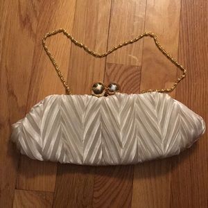 Ivory pleated clutch